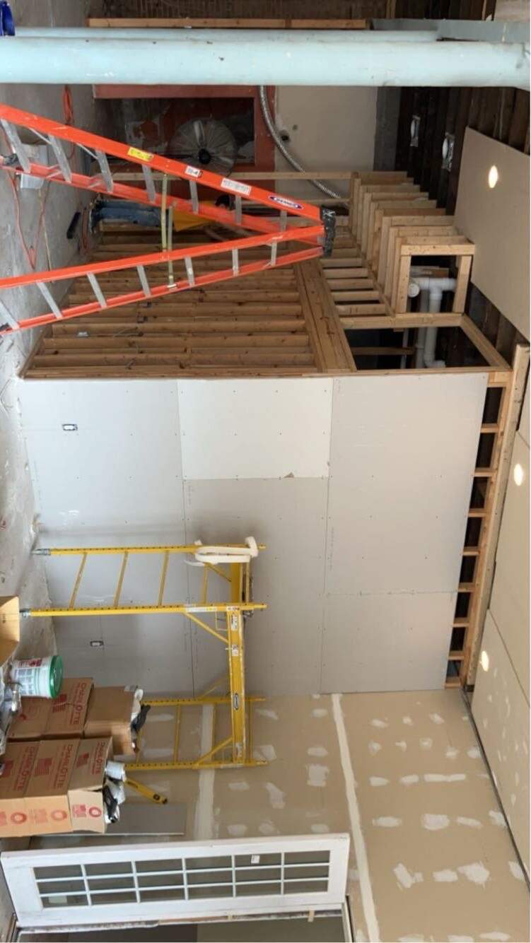 Framing and drywall install in progress