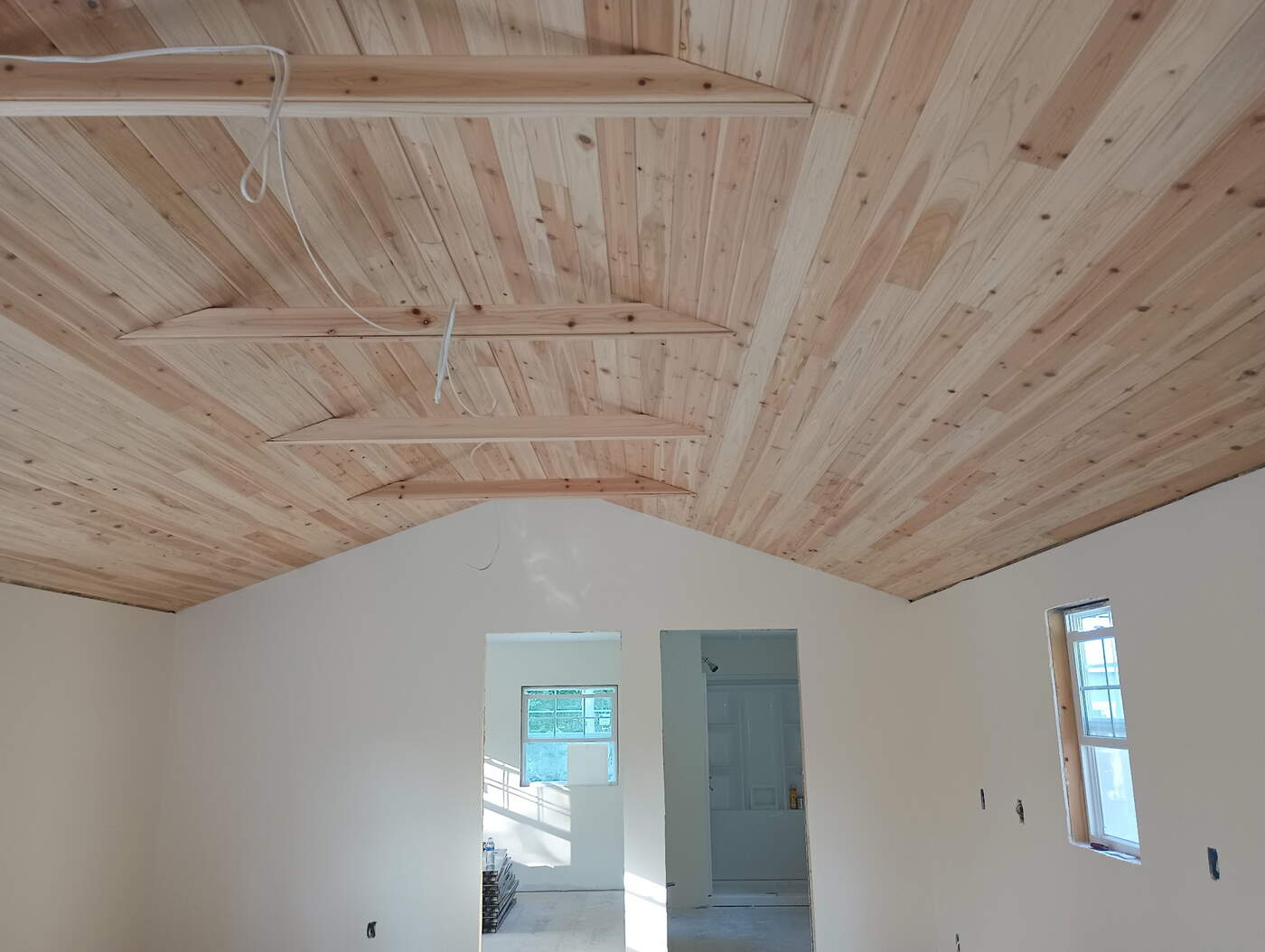 Cedar tongue and groove vaulted ceiling installation